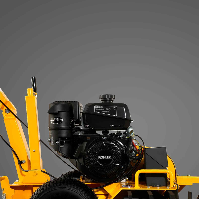 Side close-up of MechMaxx 429cc KOHLER Command PRO engine on yellow ditching mini trencher, gallery position 1