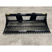 Front view of black metal skid steer rock bucket with closely spaced tines and reinforced mounting brackets on concrete floor