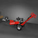 Side profile of red MechMaxx 429cc KOHLER E-Start stump grinder with tow bar and angled handle, gallery position 1