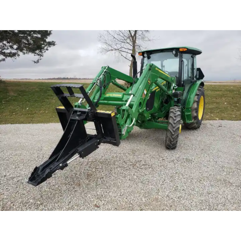 Stinger Attachments STP Tractor Tree Puller mounted on green tractor, gravel ground, square image gallery position 4
