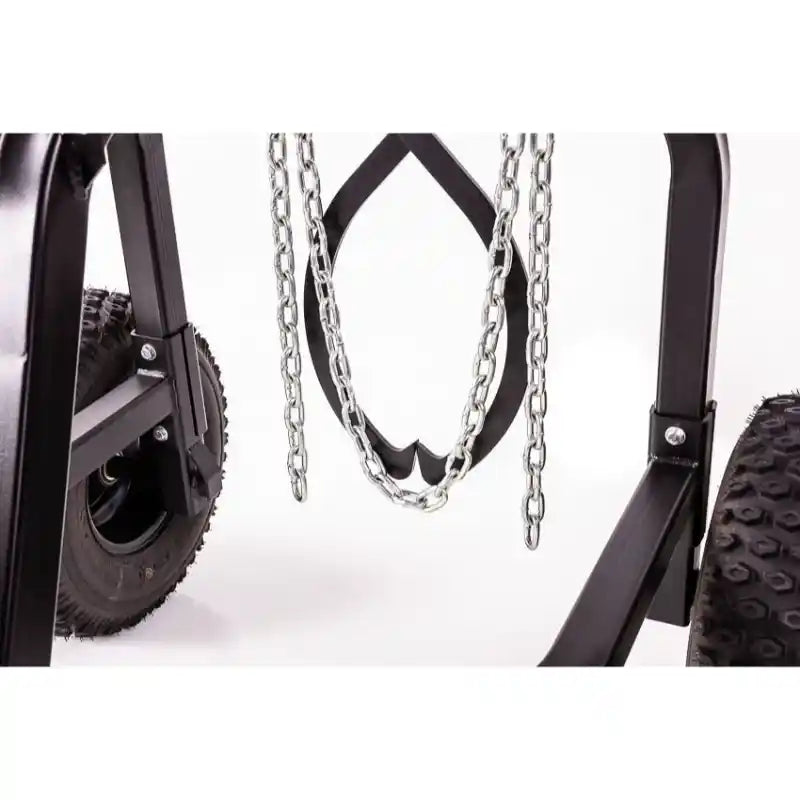Close-up view of metal skidding claw and hanging steel chains between knobby tires on Swisher ATV log skidder gallery position 1