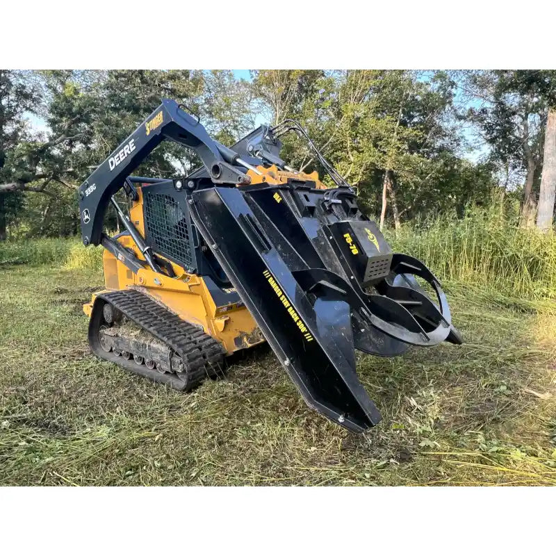 Skid steer with Stinger Attachments TF5 Twister brush cutter attachment clearing brush in outdoor setting gallery 12 square image