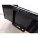Close-up of black steel skid steer attachment mounting bracket with welded reinforcements on smooth surface