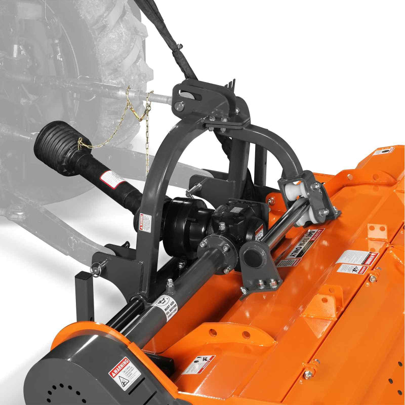 angled close-up front-left view of orange MechMaxx 78-inch PTO flail mower with gearbox and hydraulic side shift at gallery position 1