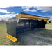 Black and yellow steel snow pusher with bolt-on cutting edge and reinforced back panel on grassy field under blue sky