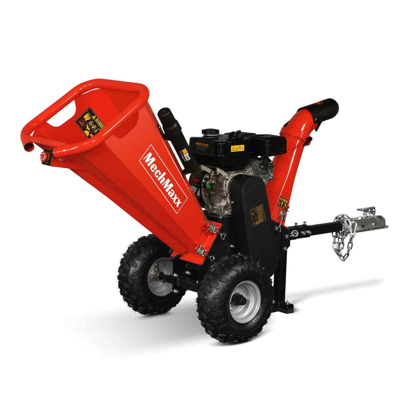 Front-side view of red MechMaxx GS650 7hp gas wood chipper with towbar and rugged tires on white background