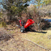 Red MechMaxx GS650 7hp Ducar wood chipper with towbar and pneumatic tires positioned on grass, gallery position 1 outdoors