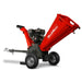 Red MechMaxx GS1500 15hp gas wood chipper with 5-inch feed chute, towbar, and metal wheels, gallery position 1