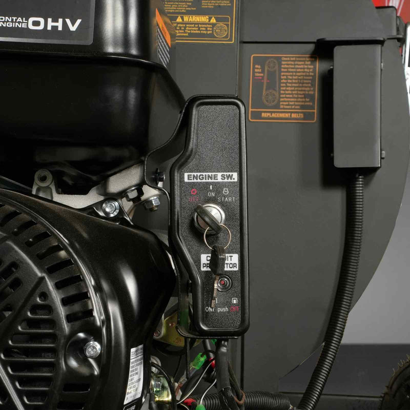 Close-up of engine switch panel with key on MechMaxx 5-inch Ducar E-Start gas disc wood chipper, gallery position 1