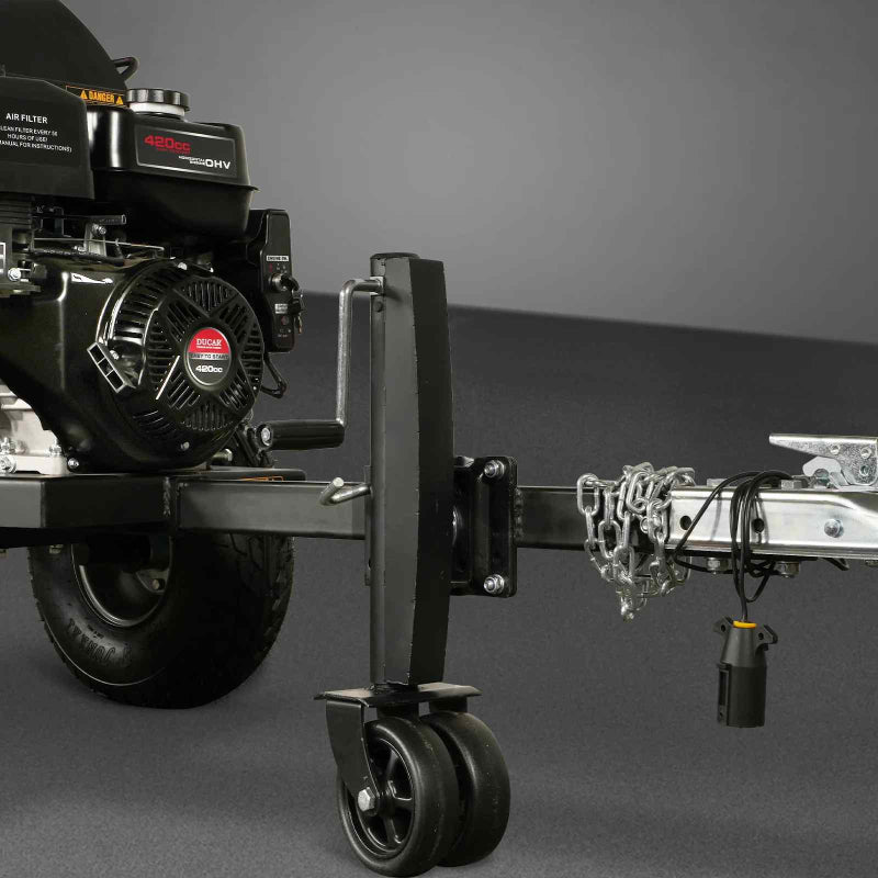 Close-up of MechMaxx 5-inch Ducar E-Start wood chipper tow bar and caster wheel with safety chains, gallery position 1