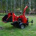 Rear angle of MechMaxx 7-inch hydraulic feed wood chipper with open chute and ZONSEN GB750 engine, gallery 1