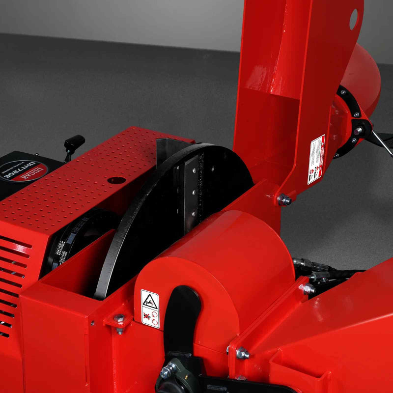 Close-up of cutting blade and red metal housing on MechMaxx 7-inch hydraulic feed wood chipper, gallery position 1