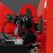 Close-up of hydraulic feed mechanism and hose connections on MechMaxx 7-inch wood chipper, gallery position 1