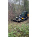 JCB skid steer with Stinger Attachments TF3 Twister brush cutter clearing overgrown brush in woodland area, square image 800x800.