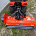Rear view of orange MechMaxx 48-inch PTO driven light-duty flail mower connected to tractor, gallery position 1
