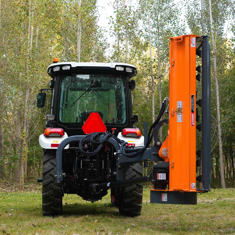 rear view of orange MechMaxx 72-inch offset ditch bank flail mower mounted on tractor at gallery position 1