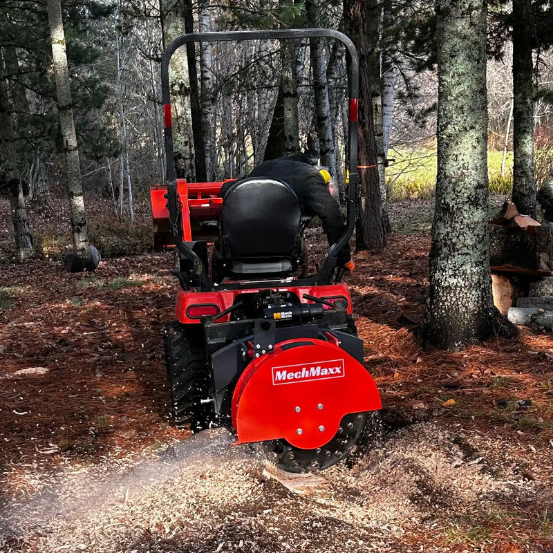rear view of red MechMaxx SG24 3-point PTO stump grinder mounted on vehicle grinding wood gallery position 1