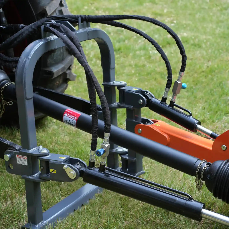 close-up of black hydraulic cylinders and gray mounting frame on MechMaxx TSG61 24-inch cutting wheel stump grinder gallery position 1