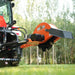 side view of orange MechMaxx TSG61 24-inch cutting wheel stump grinder mounted on tractor gallery position 1