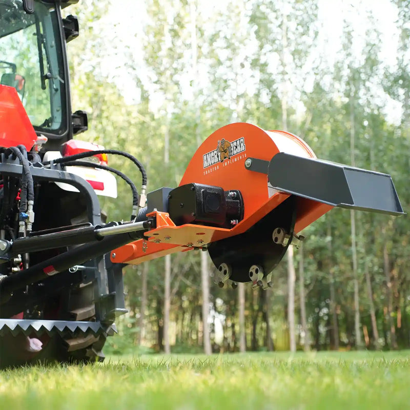 side view of orange MechMaxx TSG61 24-inch cutting wheel stump grinder mounted on tractor gallery position 1