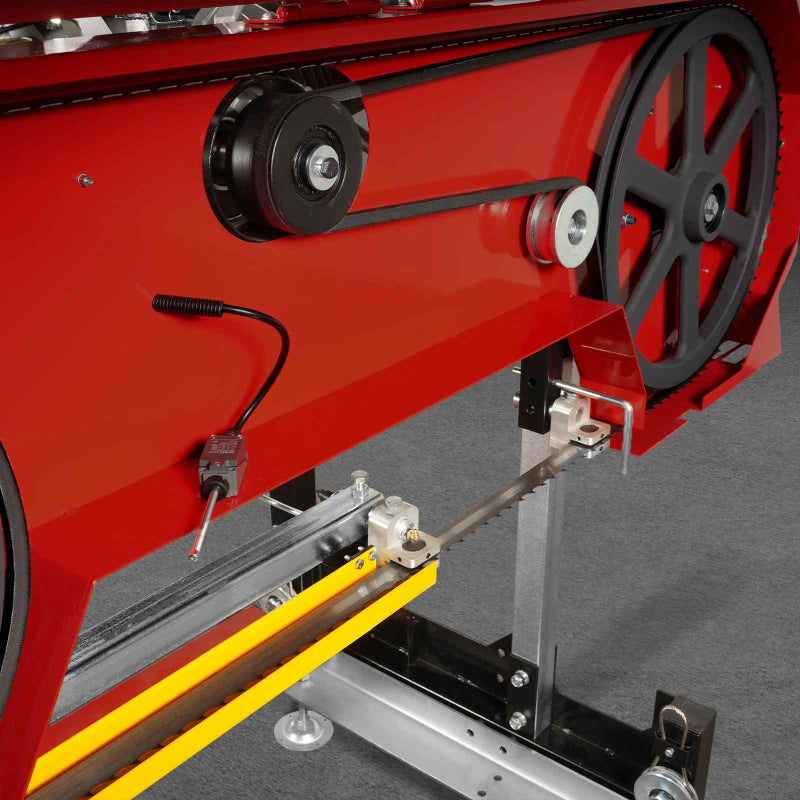 close-up of blade guide and tensioner assembly on red MechMaxx 32" portable sawmill at gallery position 1