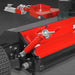 Red tow behind mower hitch assembly with adjustable linkage, black frame, treaded tire, and cutting deck