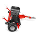 Red and black tow-behind rough cut mower with gasoline engine, treaded wheel, adjustment levers, and hitch
