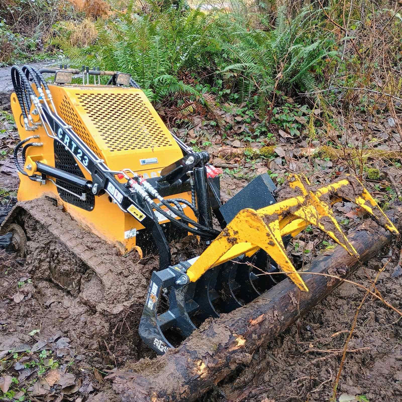 angled view of yellow and black MechMaxx 42-inch mini skid steer skeleton grapple lifting log at gallery position 1