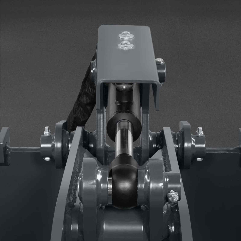 close-up view of hydraulic pivot and mounting assembly on MechMaxx 36-inch mini skid steer stump grapple bucket gallery position 1