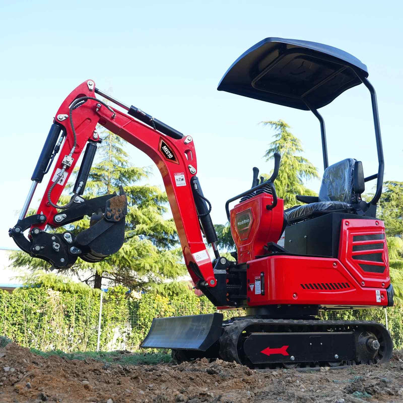 left side view of red MechMaxx MEC10 mini excavator with canopy and digging bucket raised on dirt at gallery position 1