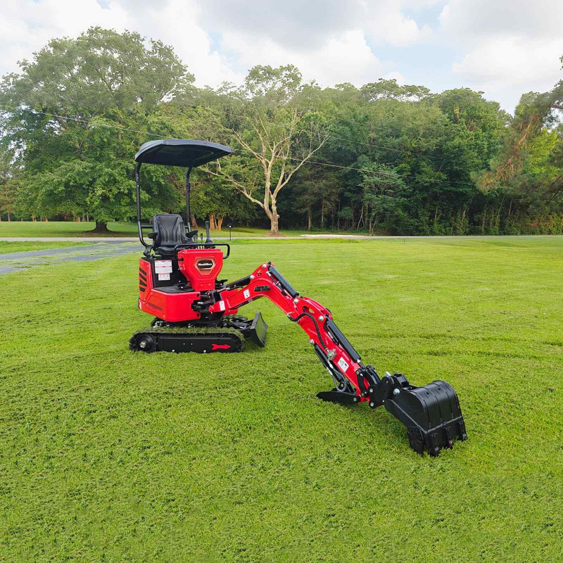 red MechMaxx MEC10 mini excavator with canopy and Honda GX390 engine parked on grass with digging arm extended gallery position 1