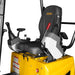 operator seat with control levers and safety labels on yellow MechMaxx MEC12 mini excavator gallery position 1