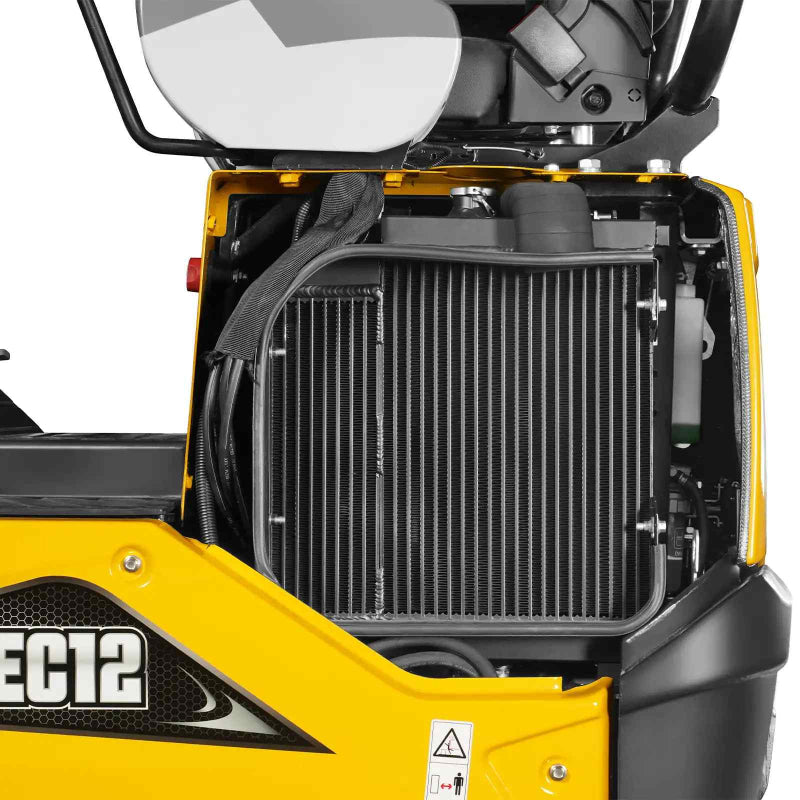 close-up of Kubota D722 engine radiator and cooling components on yellow MechMaxx MEC12 mini excavator gallery position 1