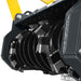 Close-up view of the MCH37 mini skid steer forestry mulcher drum with cutting blades and yellow mounting arms gallery position 1