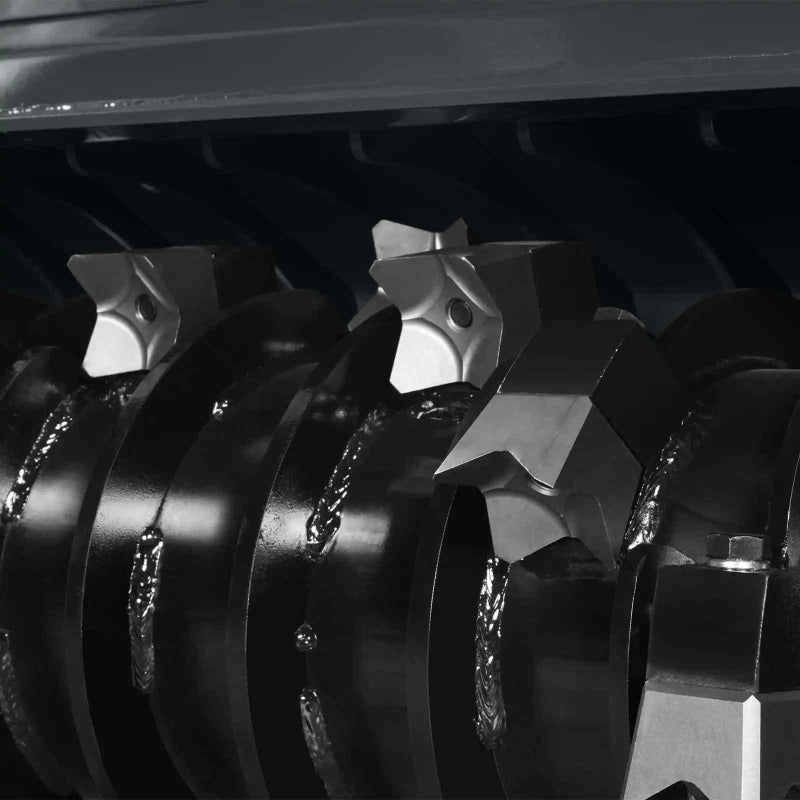 Close-up of cutting teeth mounted on the drum of MechMaxx MCH37 mini skid steer forestry mulcher gallery position 1