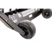 Close-up of Swisher 48" Driveway Grader front wheel assembly with smooth tires and serrated blade edge, gallery position 1