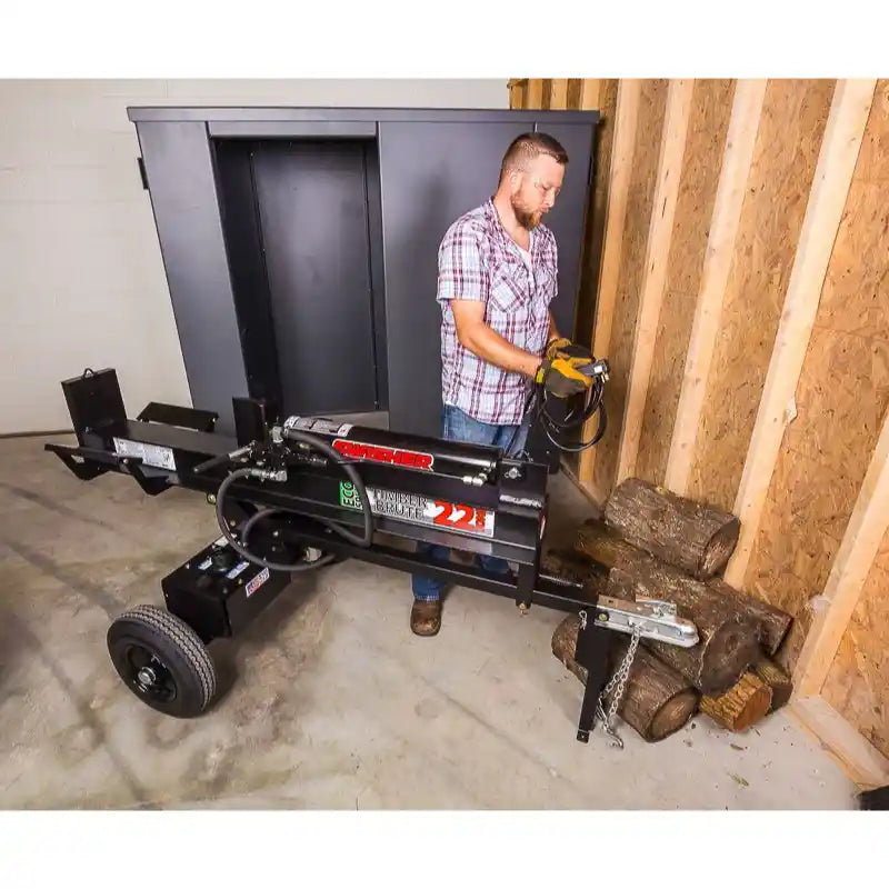 Gallery position 1 showing Swisher 22-Ton Timber Brute Eco Split electric log splitter with operator and stacked logs indoors