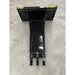 Black metal skid steer stump bucket attachment with narrow tapered body and three digging teeth on concrete floor
