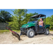 Green UTV equipped with 62-inch Swisher angle plow pushing soil, fitted with red guide rods, gallery position 1