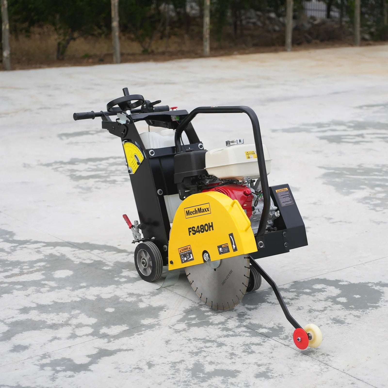 Yellow walk-behind concrete saw with red engine, white water tank, exposed blade, and front guide wheel