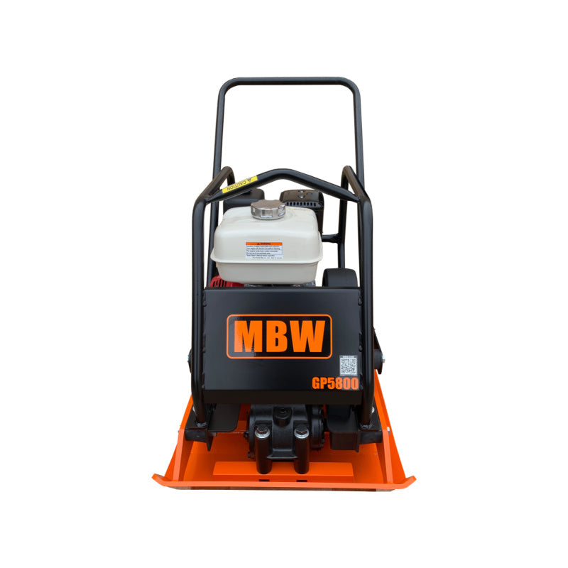 Front view of vibratory plate compactor with orange base plate, black frame, white fuel tank, and MBW logo panel