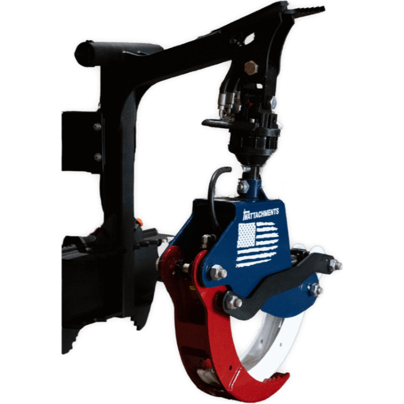 Rotating grapple attachment with red and blue painted steel arms, hydraulic hoses, and American flag decal on mounting bracket