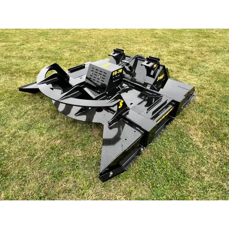 Stinger Attachments TF3 Twister skid steer brush cutter on grass, gallery position 17, 800x800 square image.