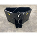 Black Stinger skid steer attachment with hydraulic mechanism on concrete surface