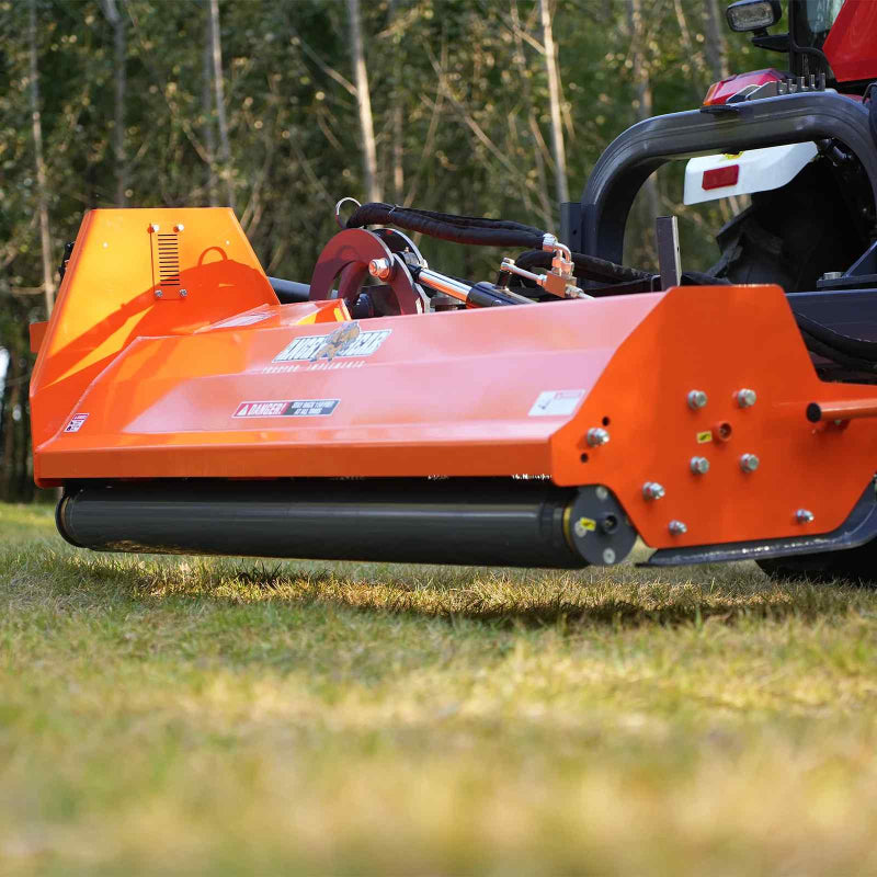 low-angle side view of orange MechMaxx 72-inch 3-point PTO offset ditch bank mower at gallery position 1