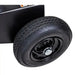 Close-up of tire and black steel wheel assembly on Swisher 34-Ton Timber Brute 14.5 HP log splitter, gallery position 1