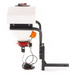 Side profile of Swisher truck spreader with white hopper, orange vibrator motor, wiring harness, and black mounting bracket, gallery position 1