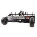Swisher Roadbuster Pro driveway grader with serrated blade, adjustable mounting brackets, and smooth turf tires, gallery position 1