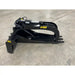 Black steel hydraulic stump grapple attachment with serrated jaws and mounting bracket on concrete floor