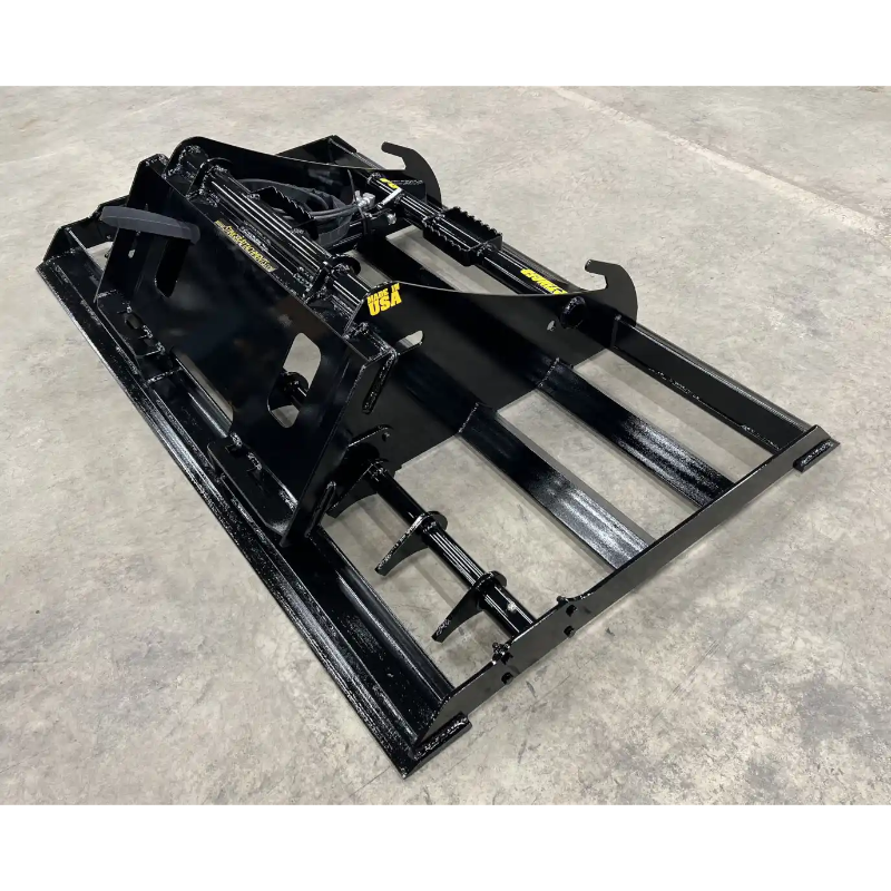 Back left angle view of black steel skid steer land plane attachment with hydraulic components on concrete floor